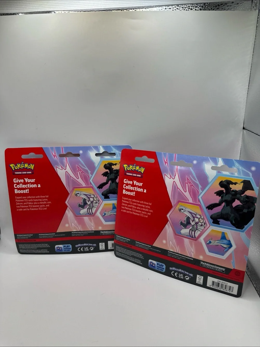 Pokemon Trading Card Blister Packs with Purple and Red Artwork